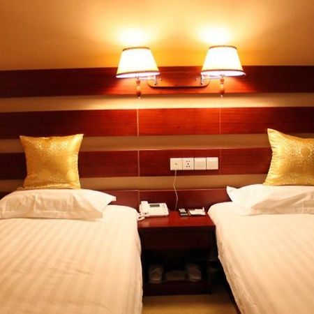 Kunshan Sunshine Business Hotel Bagian luar foto
